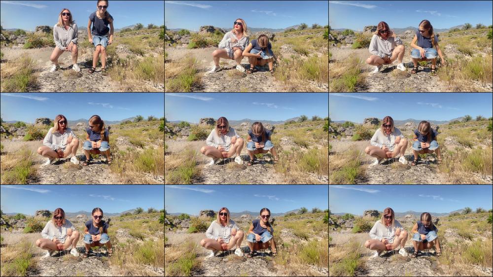 Two girls pee in nature
