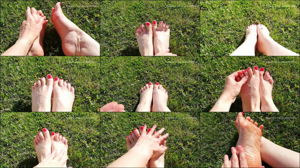 Bare feet oil massage in the garden