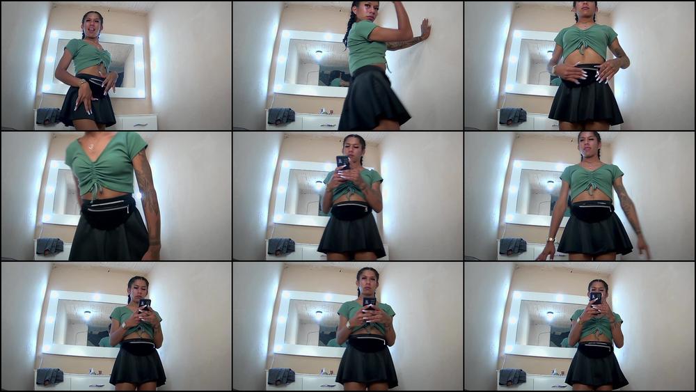 shaking ass, in black skirt