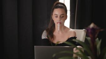 Smoking and Working on Laptop (Dani Lynn)