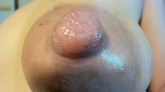 Teasing her breasts, she sucks her nipples (Milking_Dreams)