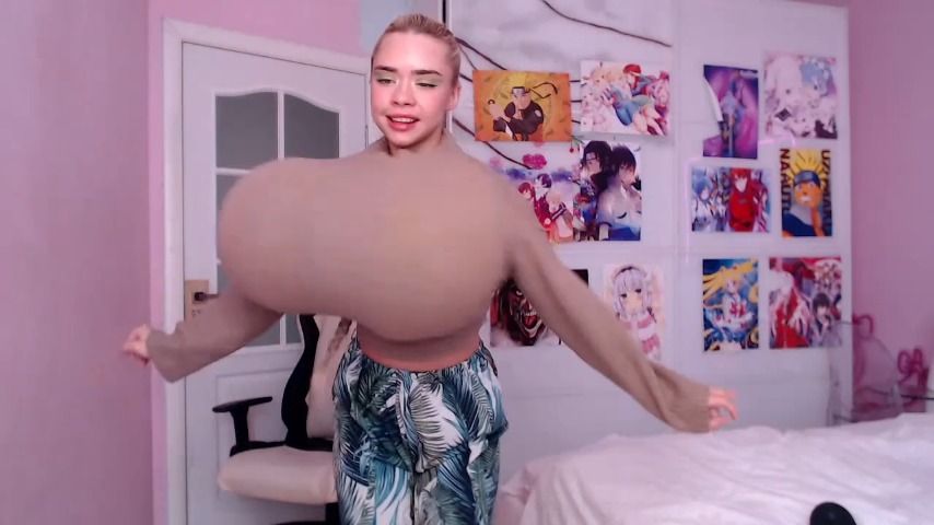 Mia is fooling with giant boobs - August 09, 2022