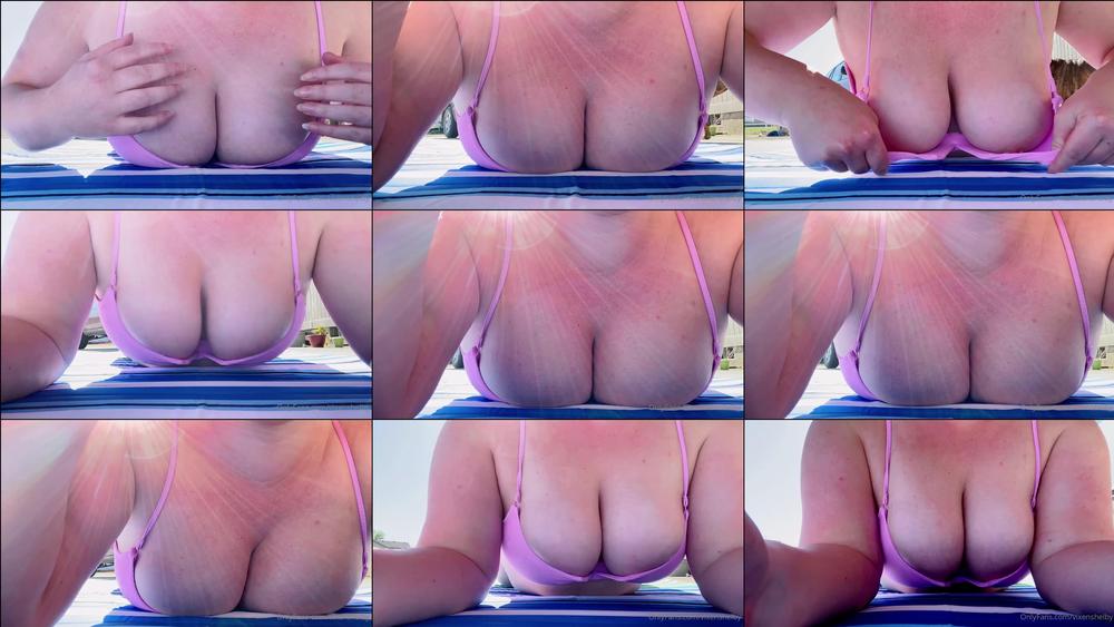 vixenshelby 142953598 boob squish video i squish shake and squeeze my boobs while laying outside getting a lil sunbathing in. i even flash my tig ol bitties at ya 