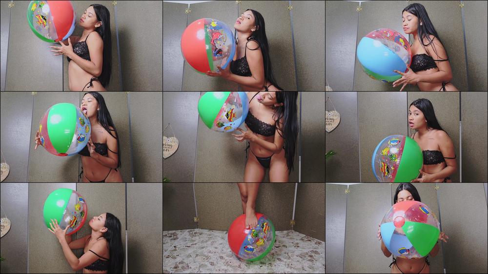 LICKING AND SPITTING BEACH BALL