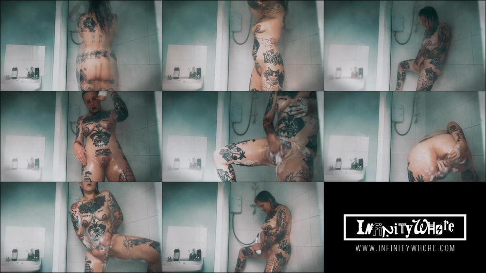 Spying On Tattooed Cutie In The Shower