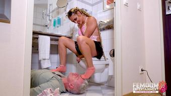 FEMDOMSQUAD Video Store - I Dominate The Slave Under My Feet In The Hotel Toilet Room ( Foot Domination With Queen Marie Mueller ) - 4K Uhd Mp4 (FEMDOMSQUAD Video Store)